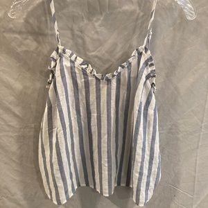 Casual blue and white stipe tank top with ruffle detail